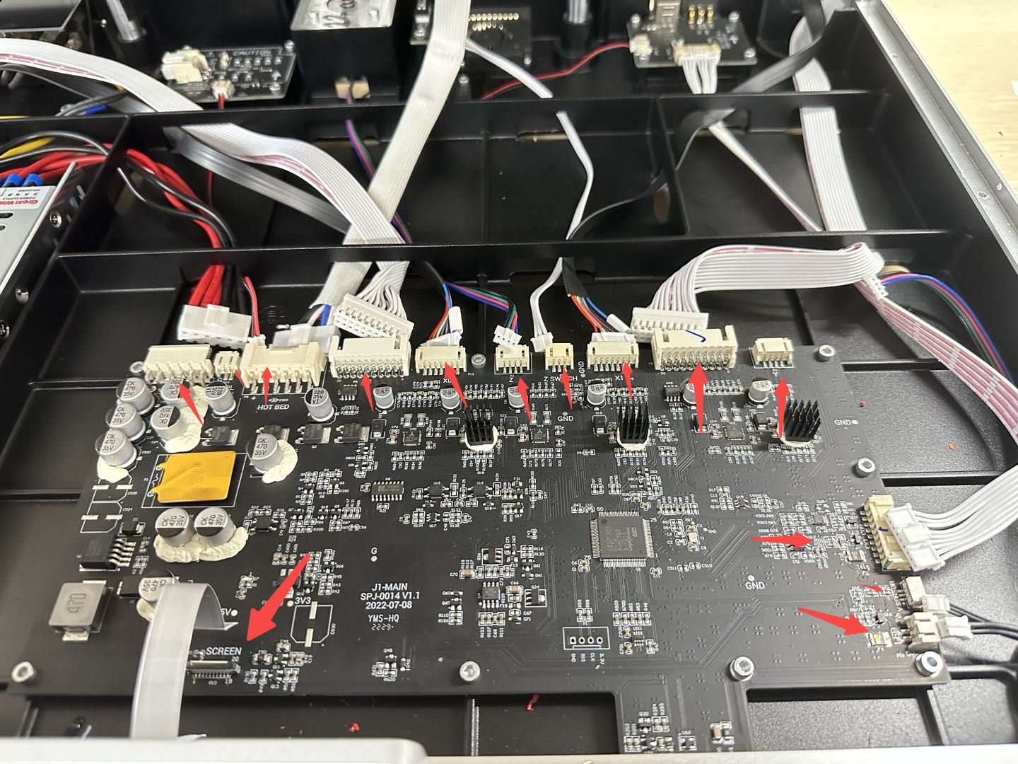 loosen_screws_securing_bottom_cover.png