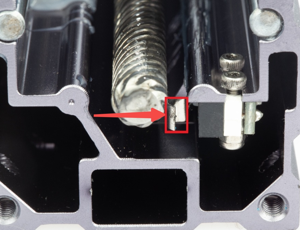 press_the_metal_piece.jpg